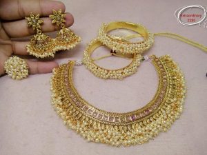 Pearl studded gold necklace set