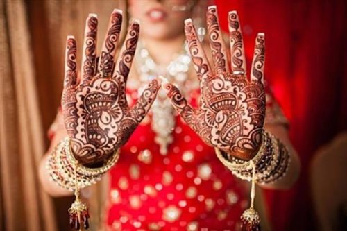 Bridal palm red mehendi design