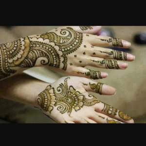 Green classic mehendi design on half hand