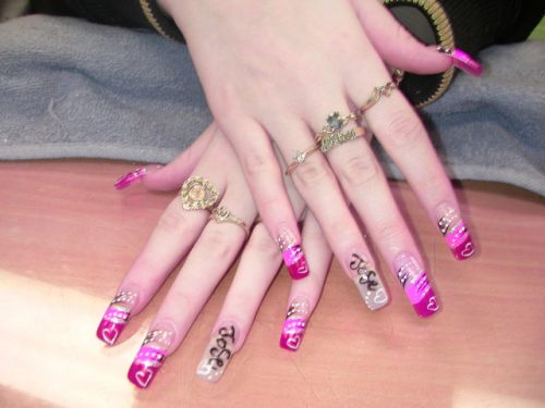 Pink colour stylish nail art and paint
